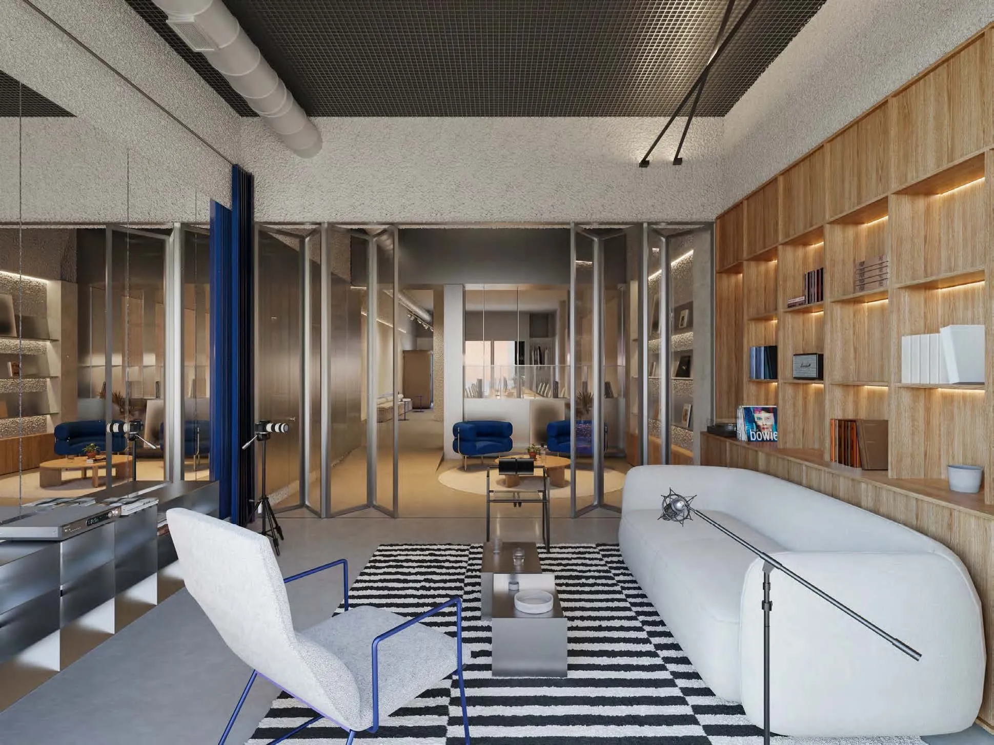 Visualización de la planta abierta, con tabiques de cristal, cortinas azules y zona de estar
